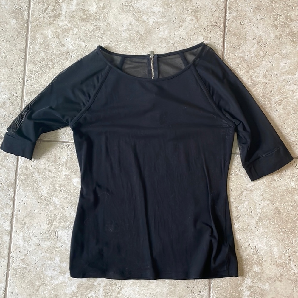 Sheer sleeves, zipper on the back